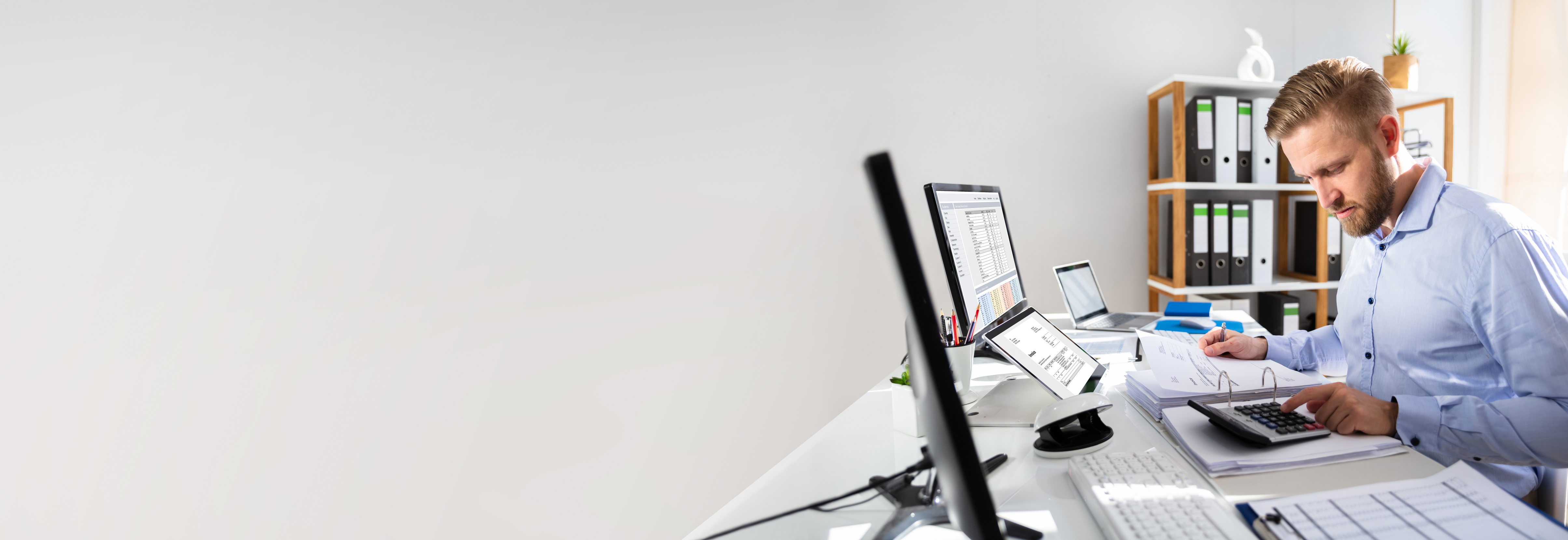 Businessperson Calculating Invoice